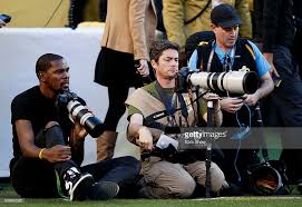 Kevin with photographers